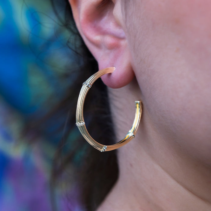 Iced Textured Bamboo Hoop Earrings in Yellow Gold