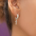 Micro Huggie Hanging Crucifix Hoop Earring in White Gold